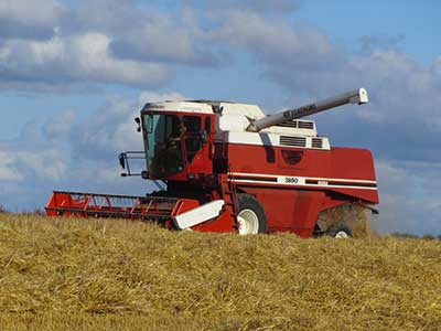 a tractor working on a farm